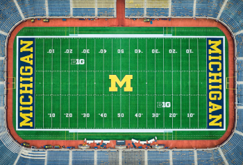 College football stadium filled with fans, representing fast-moving sports digital asset management workflows for collegiate athletics photos, video and media assets