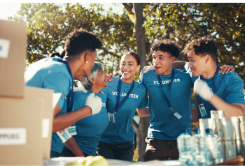 Nonprofit volunteers representing DAM solutions that help nonprofit teams manage content, protect sensitive media and support mission-driven work