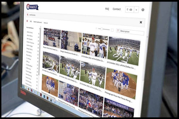 NetX digital asset management software displayed on tablet, showing a sports photo library organized for teams managing large content collections