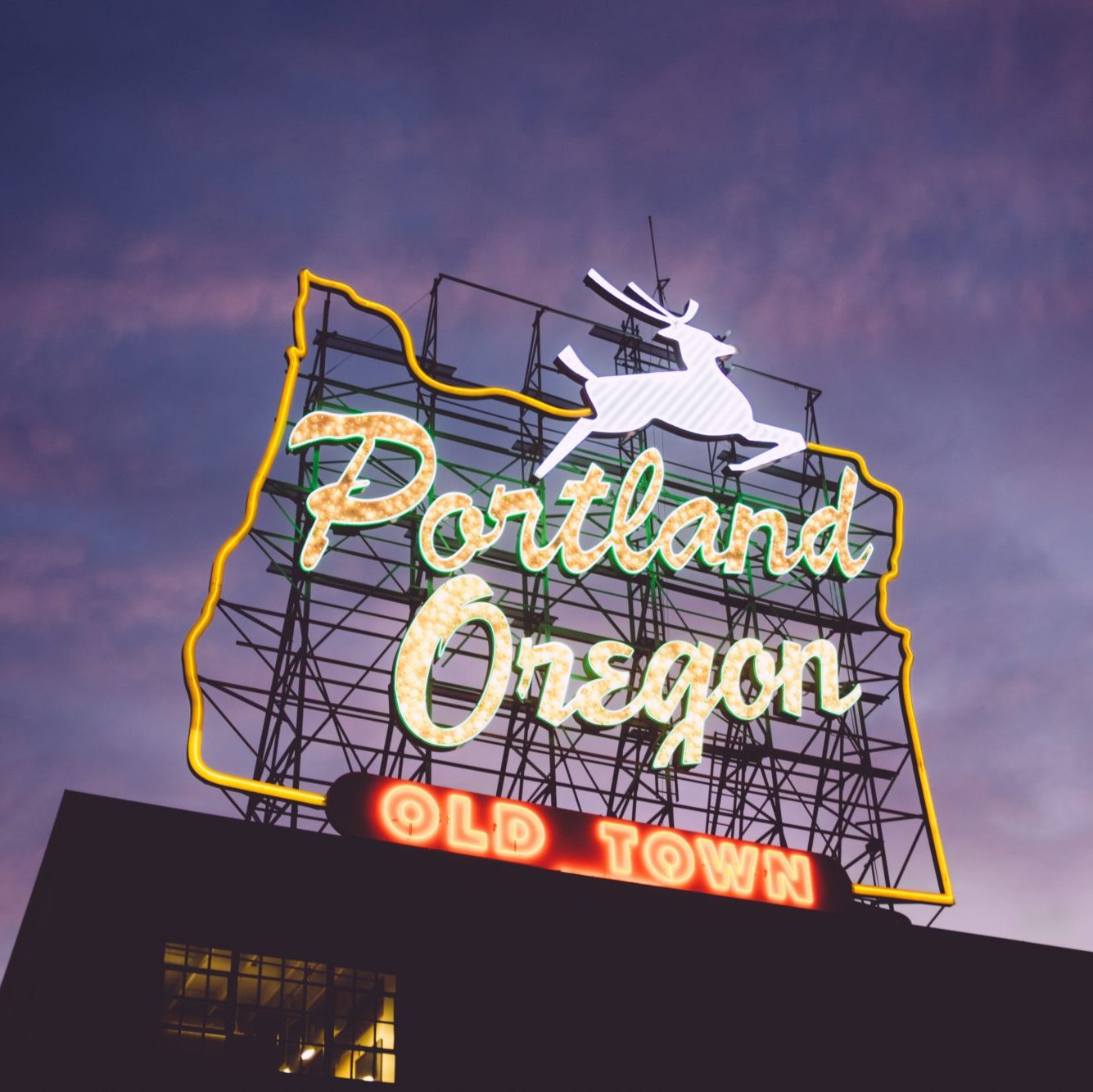 NetX 8.10 release banner featuring the Portland, Oregon, neon sign at dusk, reflecting NetX’s Portland headquarters
