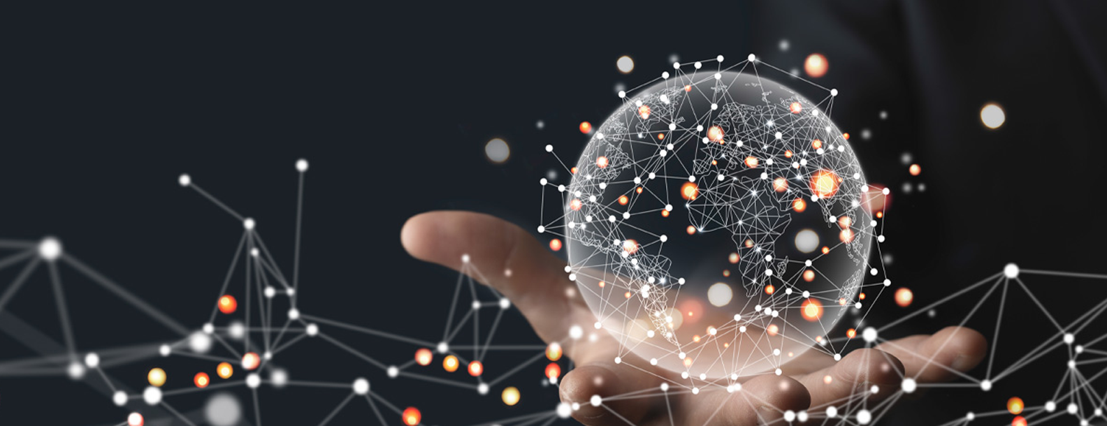 Hand holding a digital globe surrounded by interconnected nodes and glowing data points, representing connected digital assets.