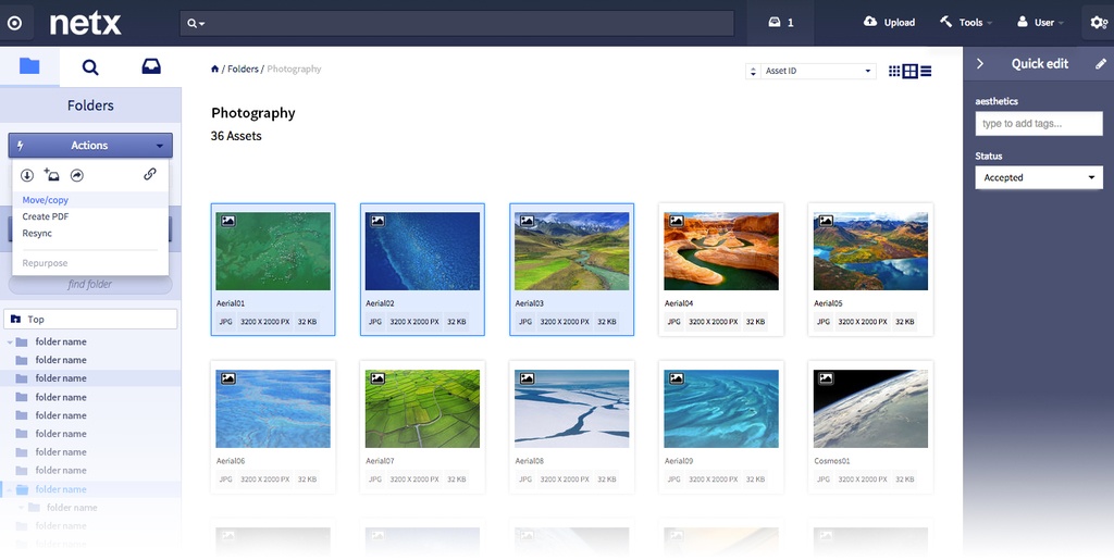 NetX Version 8 digital asset management interface displaying a Photography folder with 36 assets and a grid of aerial landscape photographs.